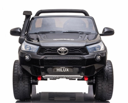 2022 RutasCr58 Toyota Hilux -24v - Pantalla - Llantas de hule -Pintura pulverizada negra - control remoto - Asientos de cuero