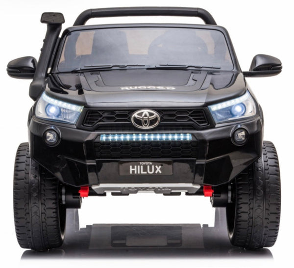 2022 RutasCr58 Toyota Hilux -24v - Pantalla - Llantas de hule -Pintura pulverizada negra - control remoto - Asientos de cuero